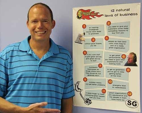 CEO of StickerGiant Showing the 12 Laws of Business