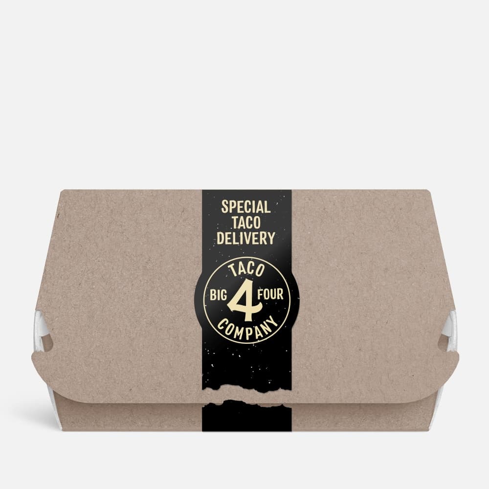 Matte paper taco delivery label sealing a kraft takeout box.