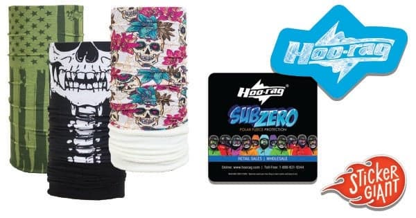 A group of colorful Hoo Rag wearable bandanas in various skull and patterned designs displayed alongside Hoo Rag Sub Zero packaging and branded logo stickers printed by StickerGiant.