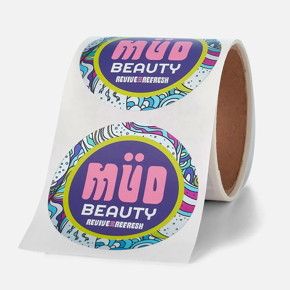 Custom kiss cut stickers on a roll with easy-peel backing and full-color printing.