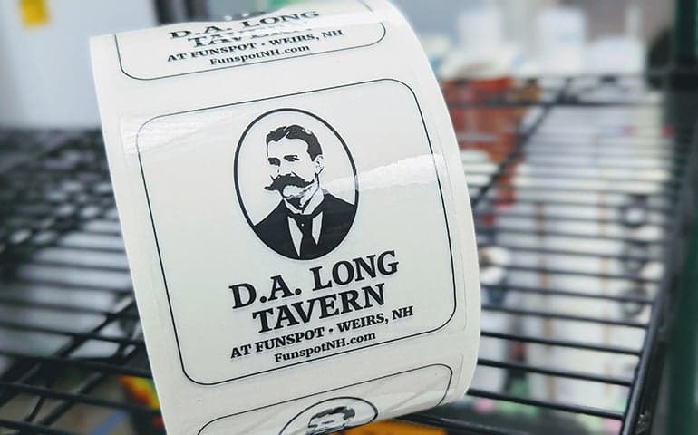 Roll of Clear Labels for D.A. Long Tavern with black illustration and text.