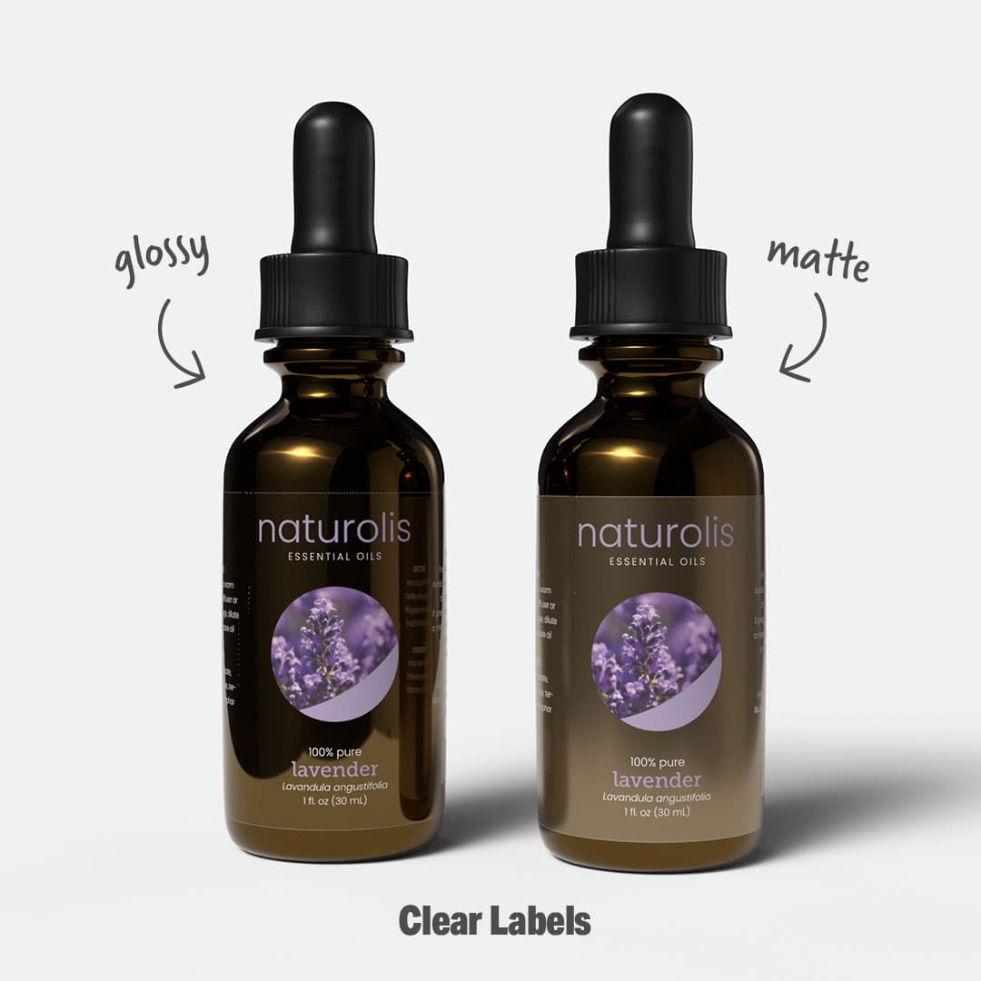 Side-by-side comparison of glossy vs matte finishes on custom clear labels, featuring Naturolis Essential Oils lavender bottles.