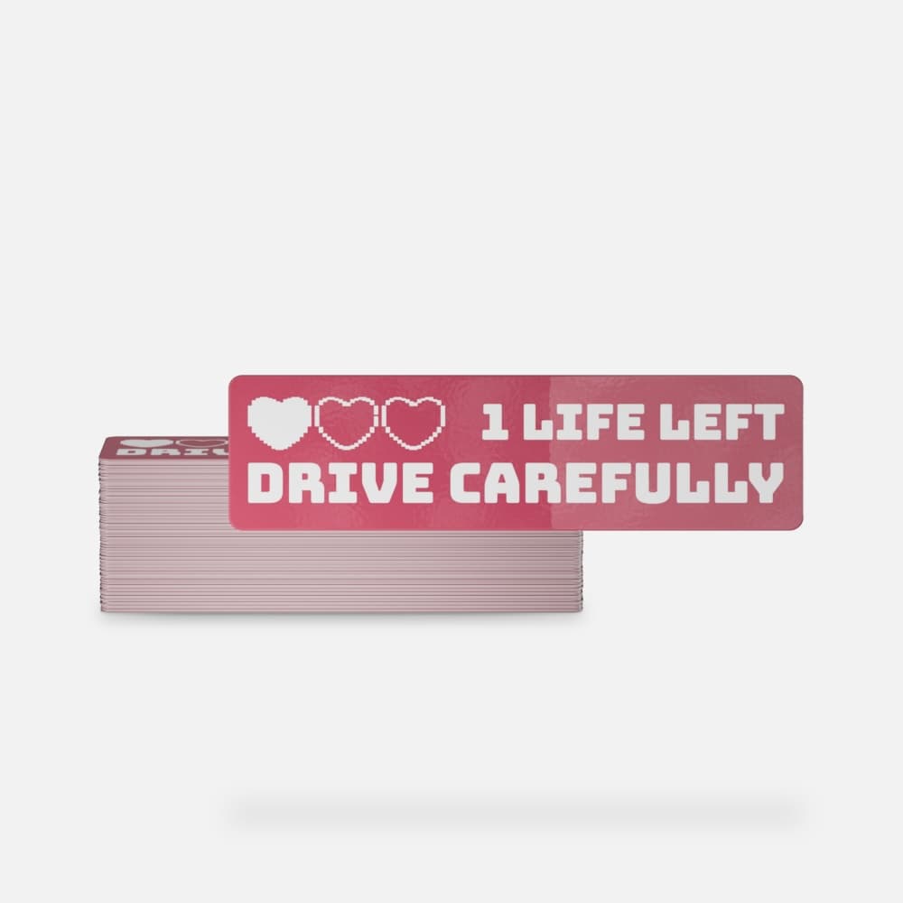 Stack of custom bumper stickers with full-color printing and durable outdoor material.